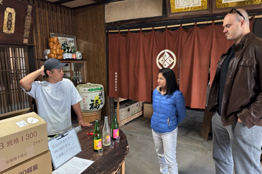 Sake brewery talking to guests copy